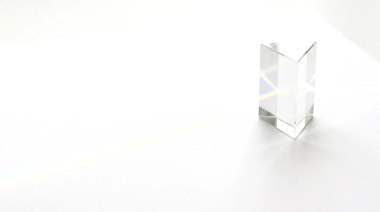 A transparent prism in an open, bright composition.